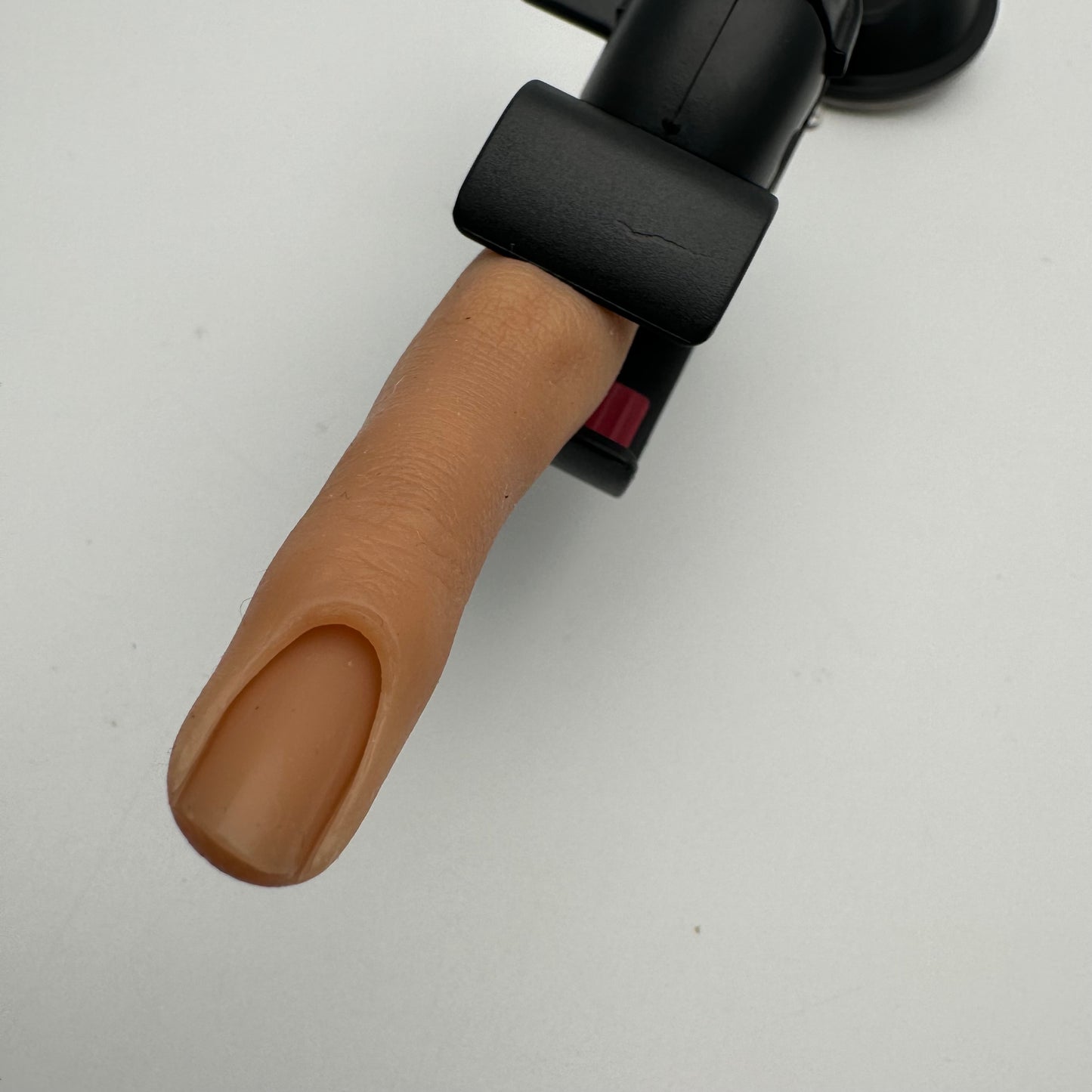 Training finger with attachment