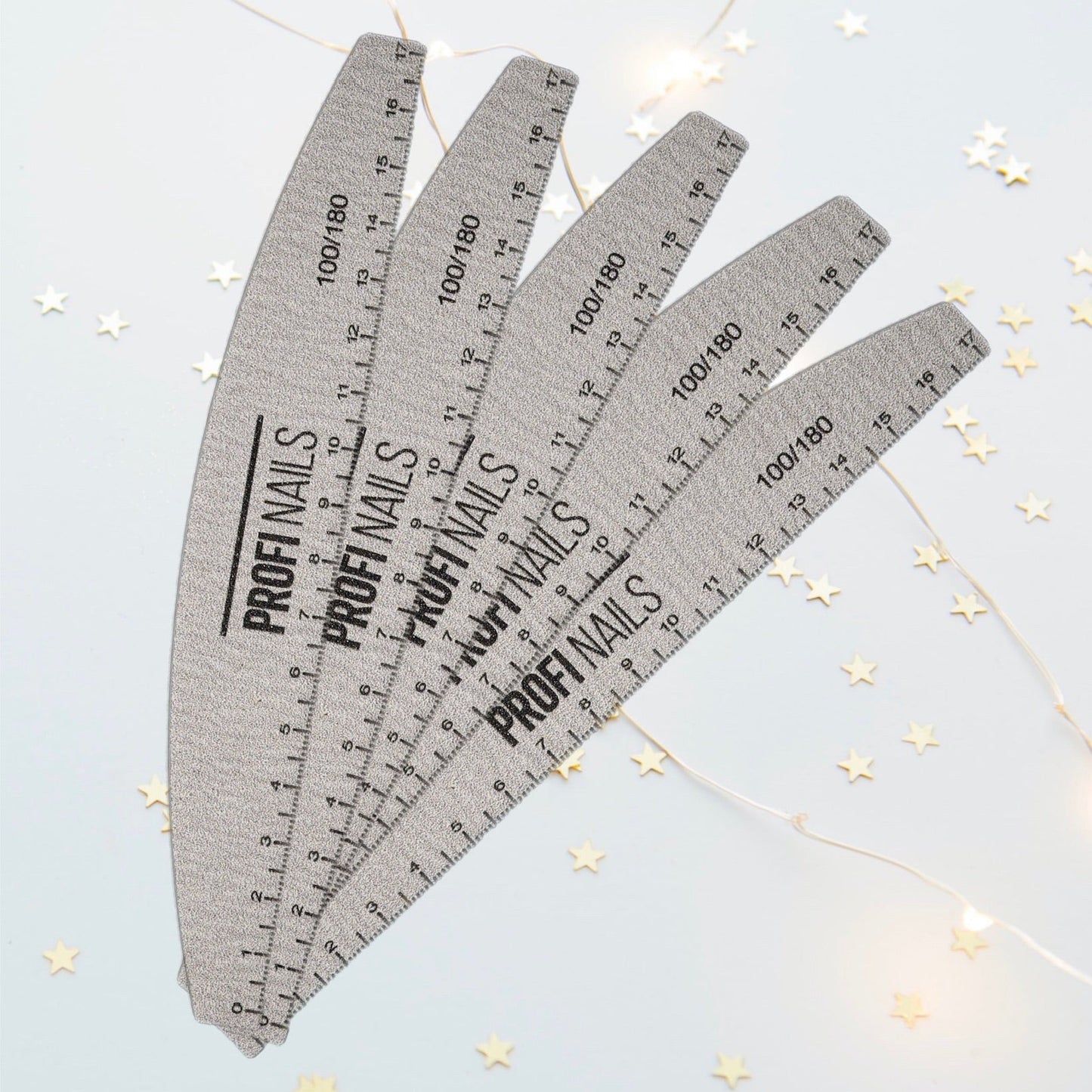 Nails file with a ruler