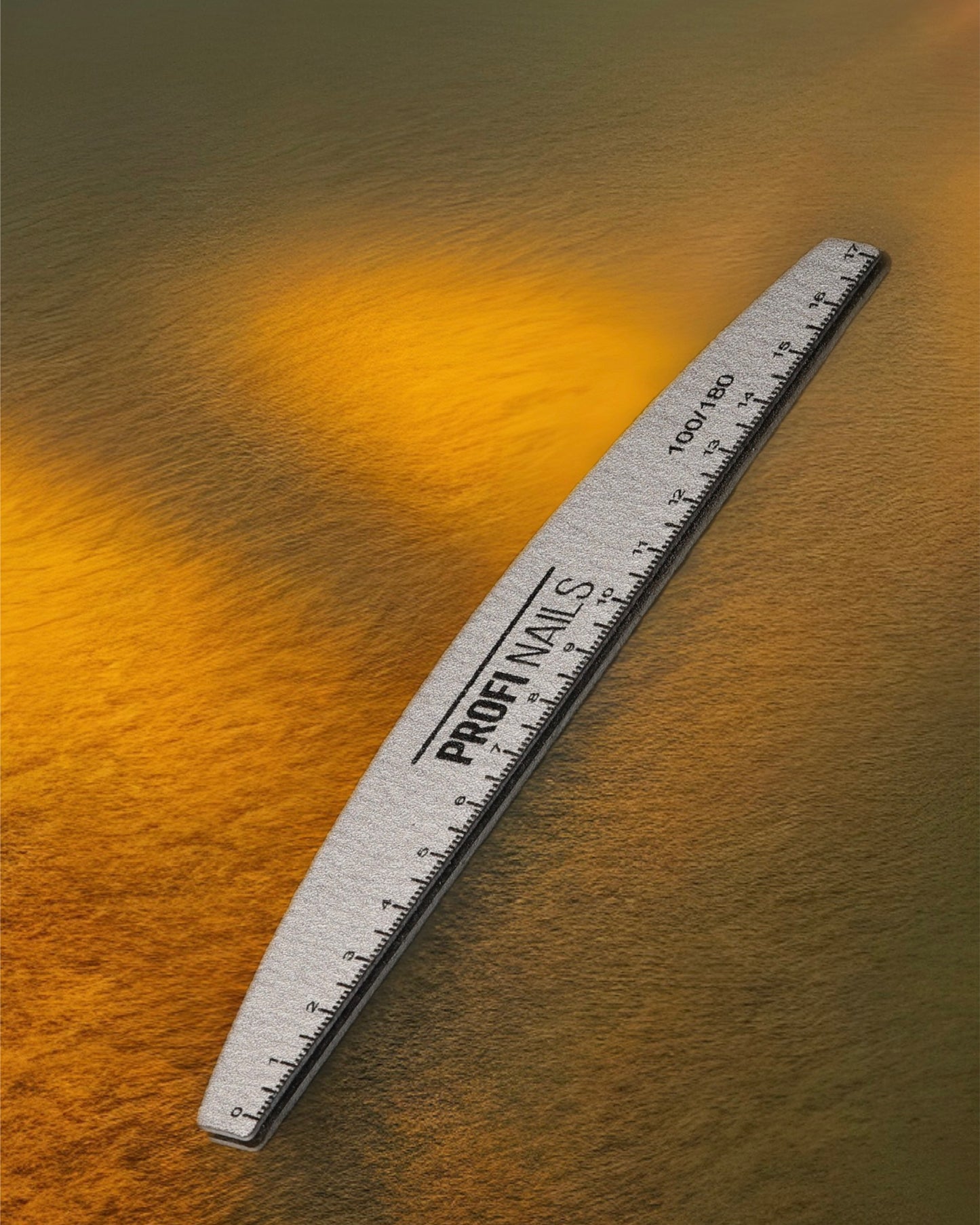Nails file with a ruler