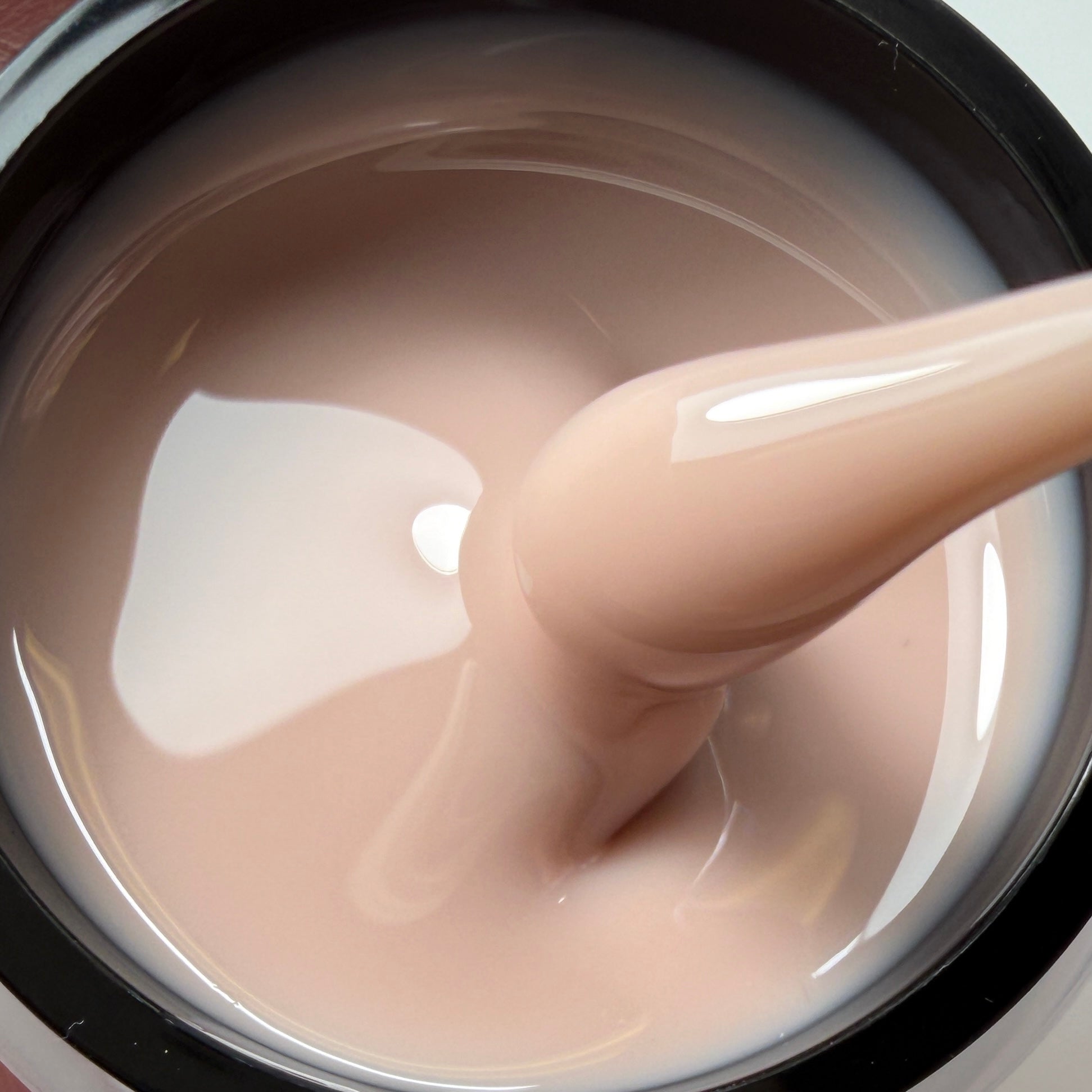 Self-leveling beige hard gel for overlays and extensions