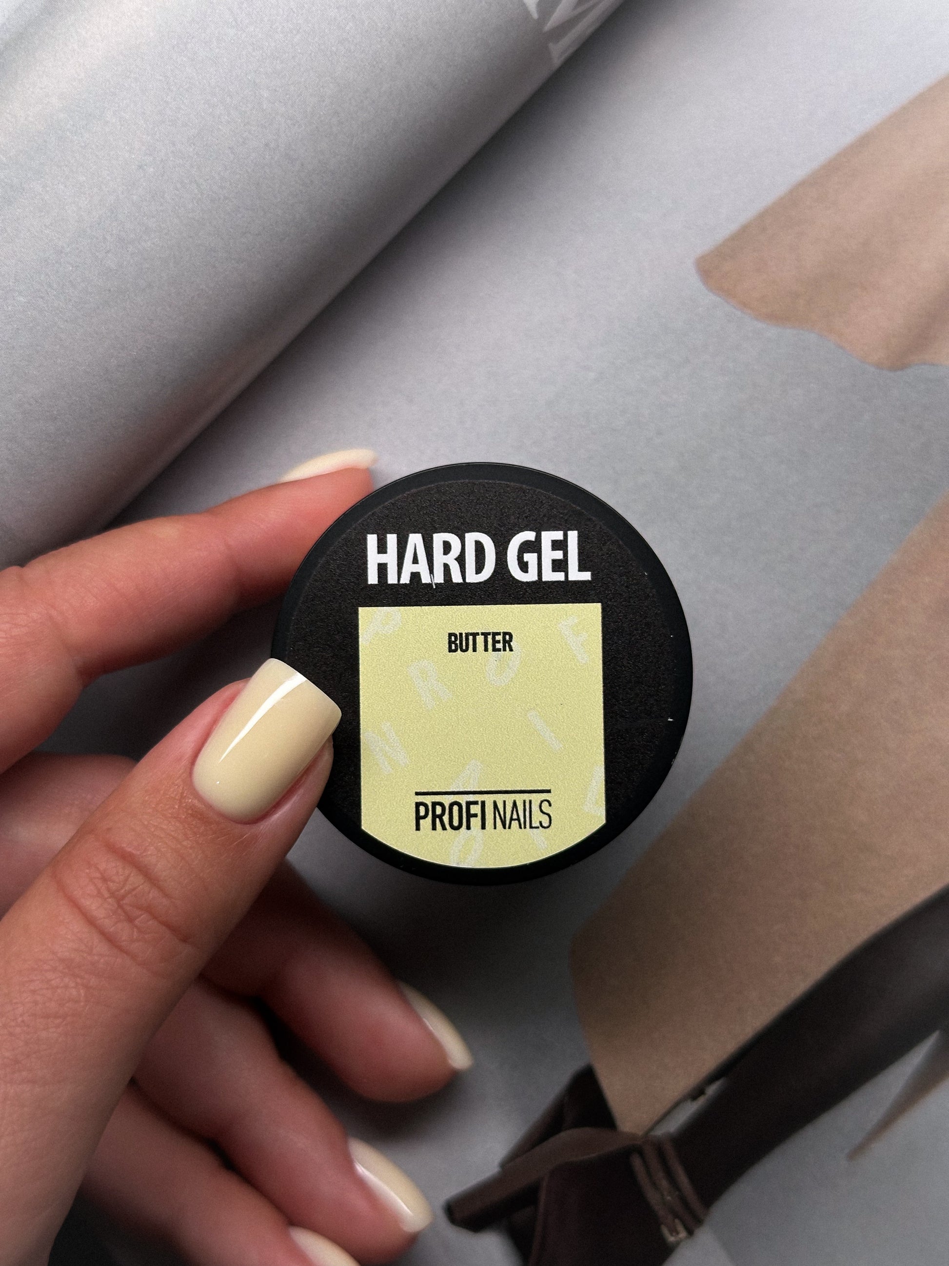 Pastel yellow hard gel for structured spring and summer manicures