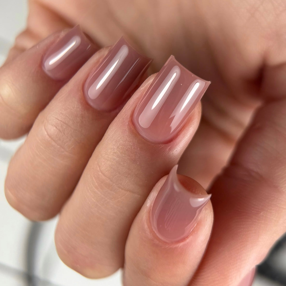 Warm chocolate cream builder gel for elegant salon nail designs