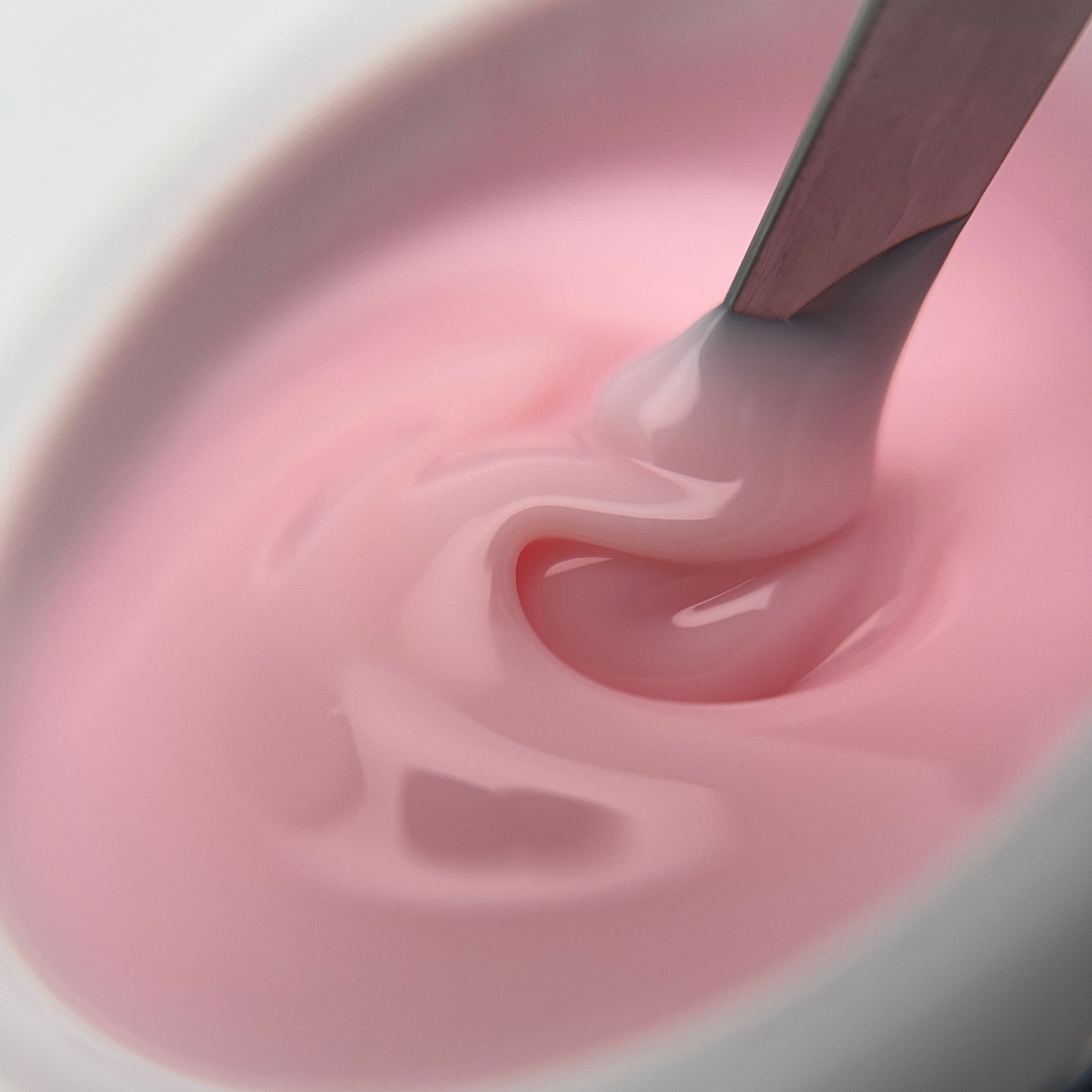 Soft rose nude builder gel for elegant salon nail designs
