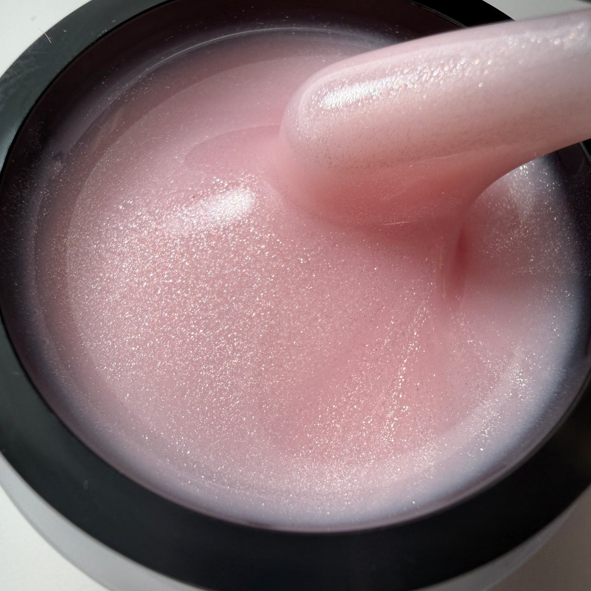 Pretty shimmer Liquid Gel from Profi Nails shown for professional structured gel manicure services.