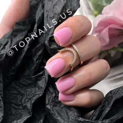 Professional Lotus Kiss hard gel for natural-looking pink nail overlays