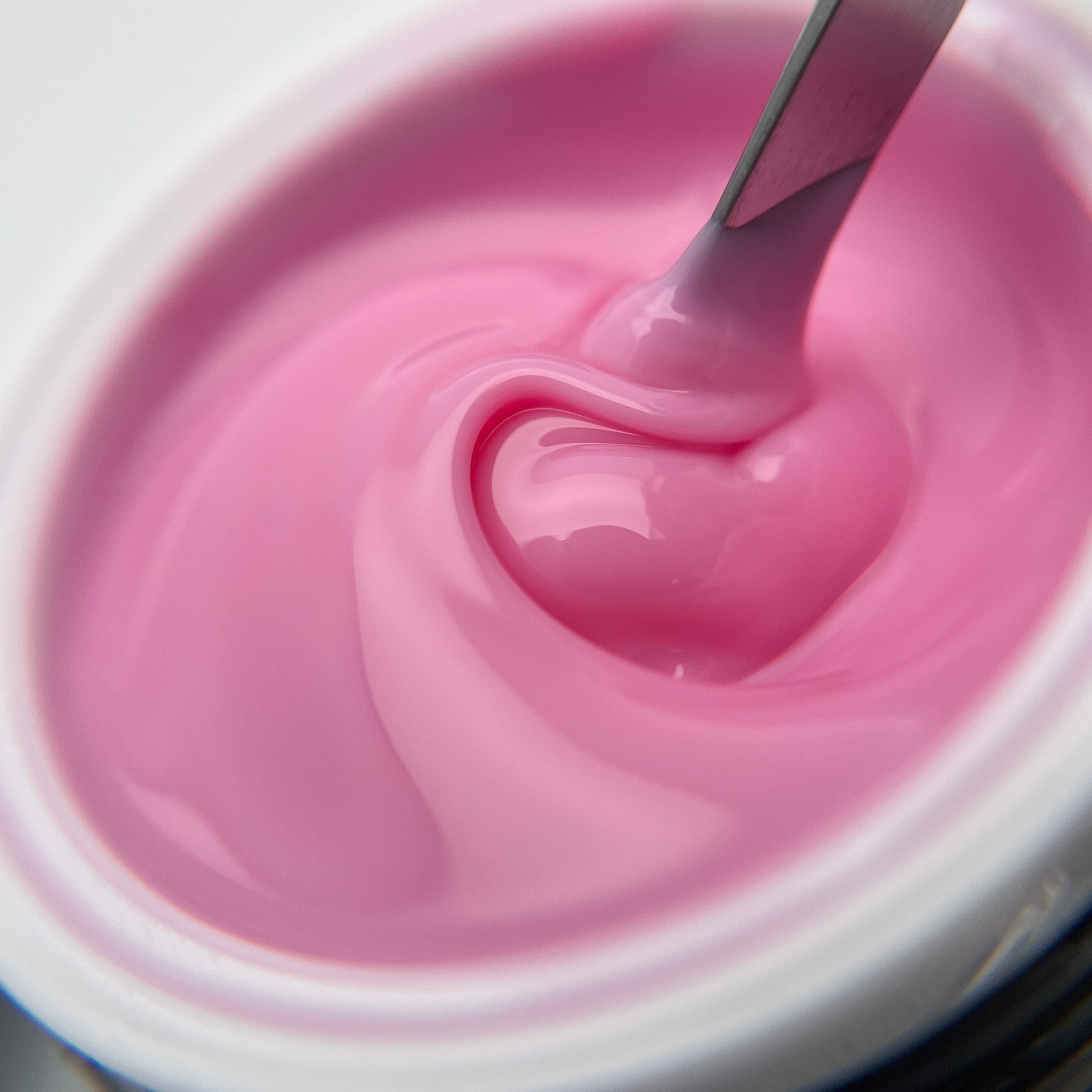 Soft pink builder gel for bridal-inspired salon nail designs