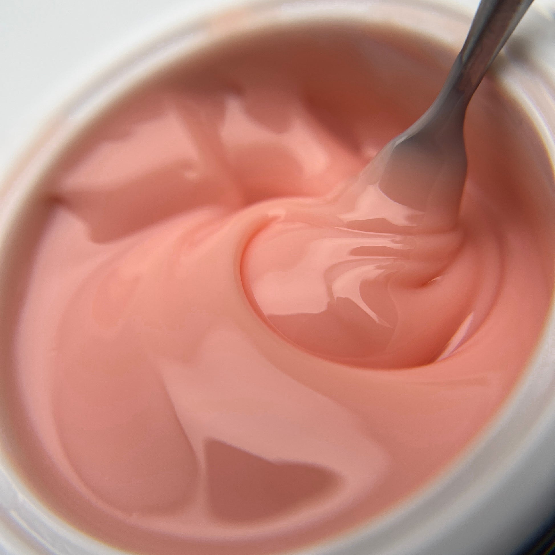 Peach self-leveling builder gel for professional nail technicians